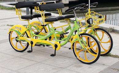 奧威特多人聯(lián)排自行車 一體輪設(shè)計(jì)、雨篷配置，打造舒適多人騎行體驗(yàn)